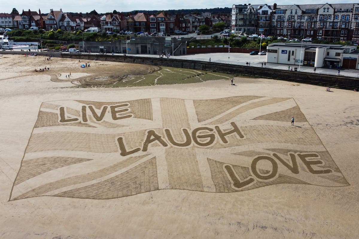 ‘Live, laugh, love’ sand sculpture created in response to far-right riots sparks barrage of jokes