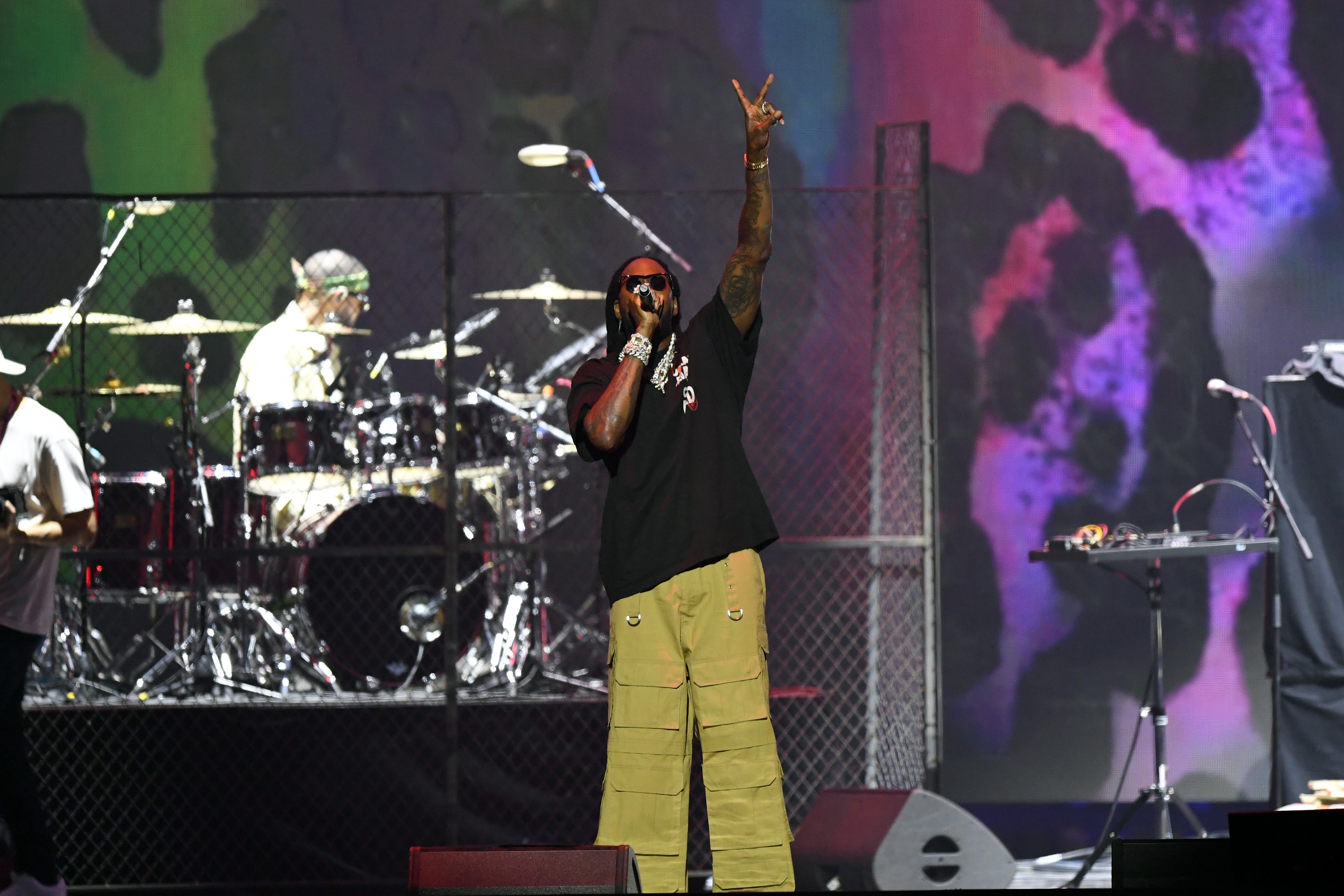 Tauheed Epps, also known as 2 Chainz, pictured performing at a music festival on July 5. Epps’ investment firm is suing a cannabis company for more than $10m after a 2021 deal went south