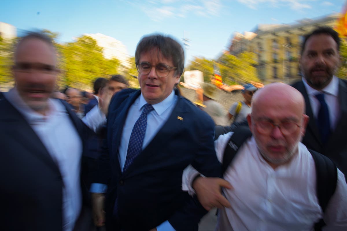 Fugitive ex-Catalan leader said to be in Belgium as Spanish police try to explain how he escaped