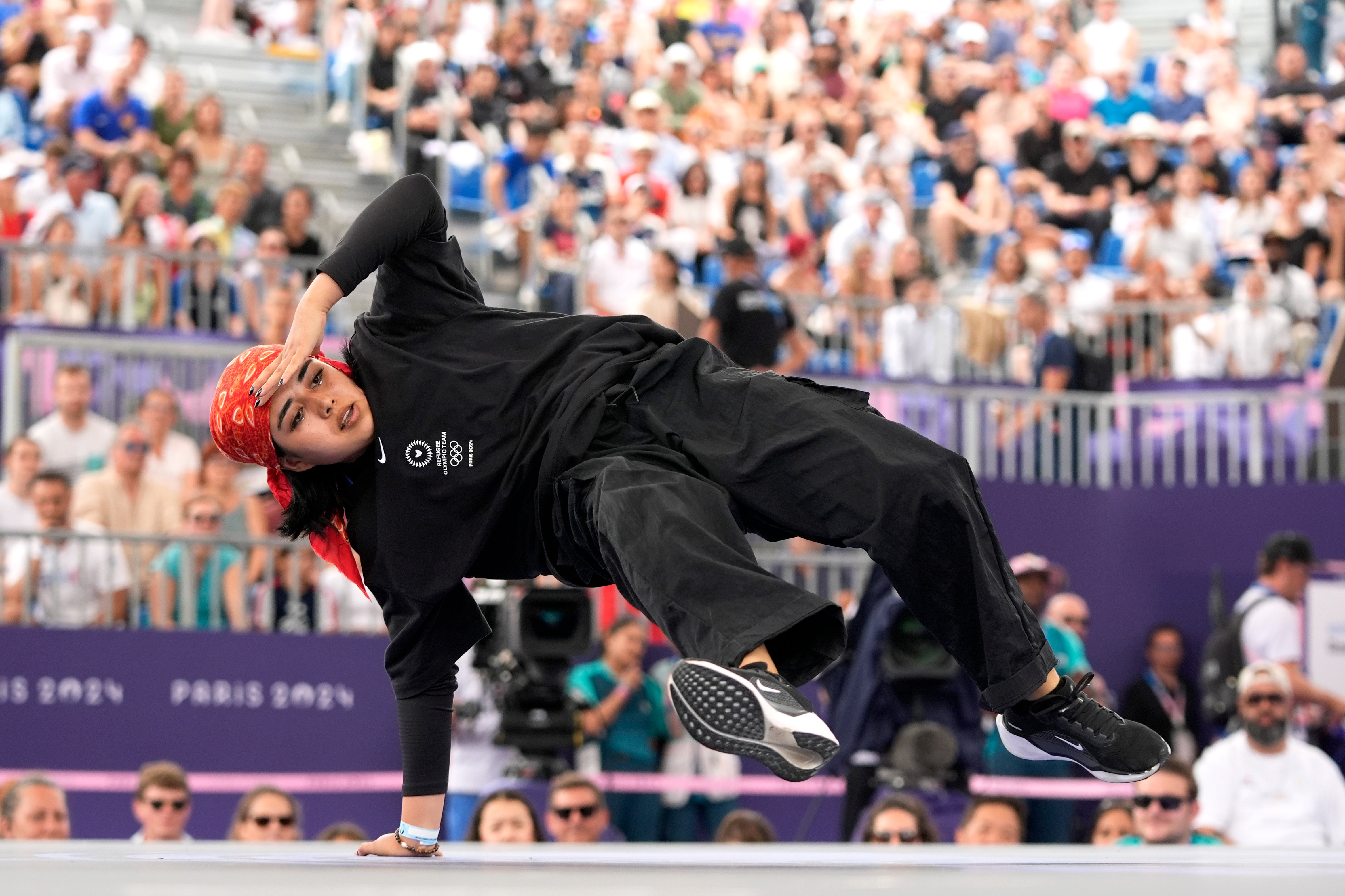 Refugee Olympic team’s Manizha Talash, known as Manizha, competes in the Women’s Breaking dance qualifying round.