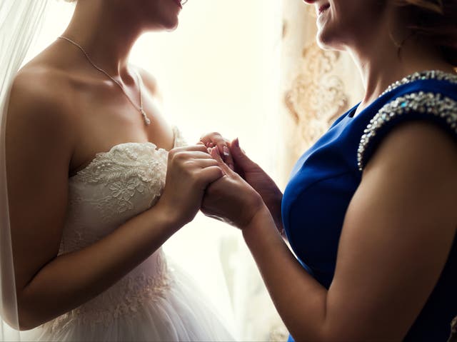 <p>A bride expects her retired art teacher mom to pay for her age-gap wedding (Getty Images)</p>