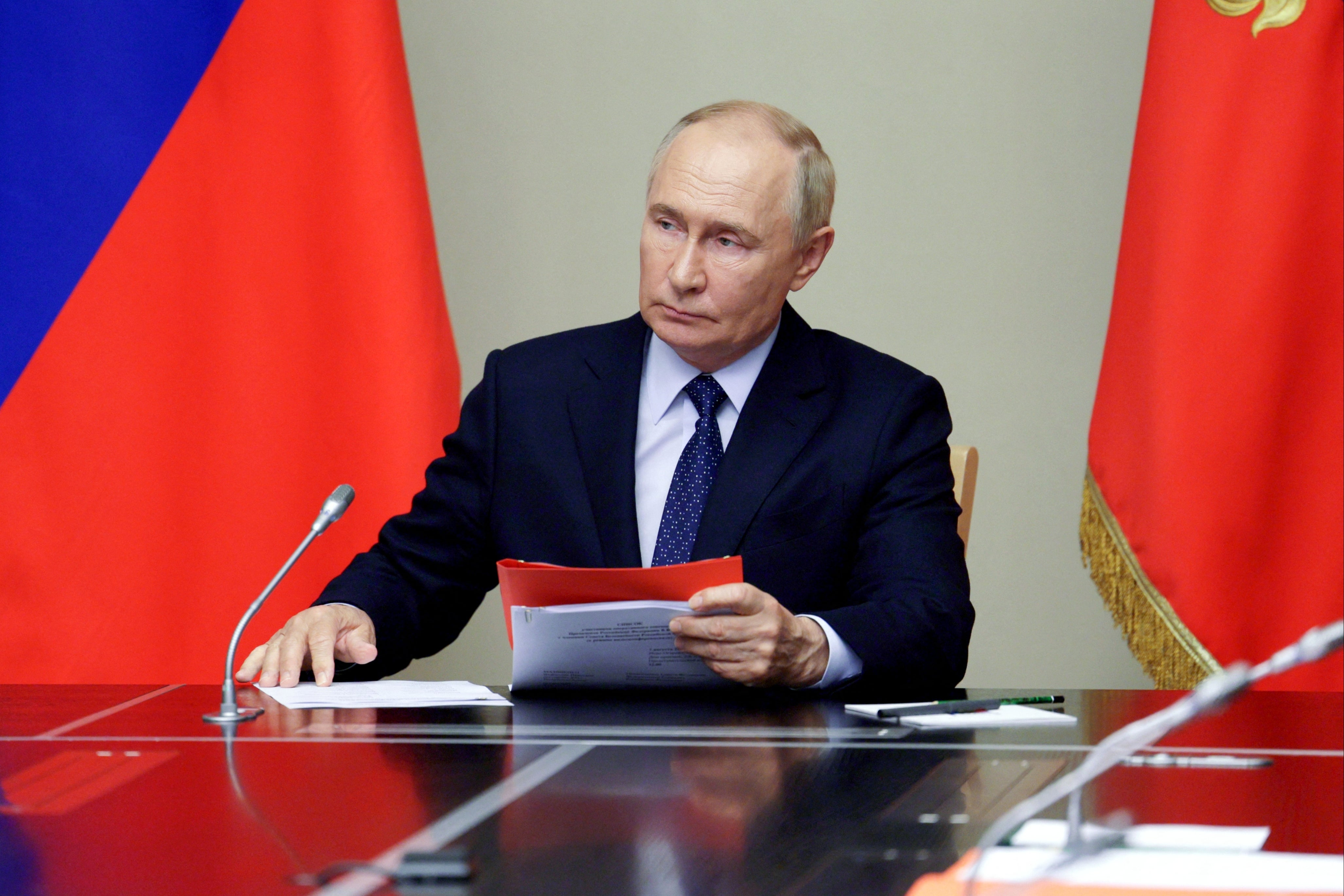 President Vladimir Putin chairs a meeting with Security Council on Friday