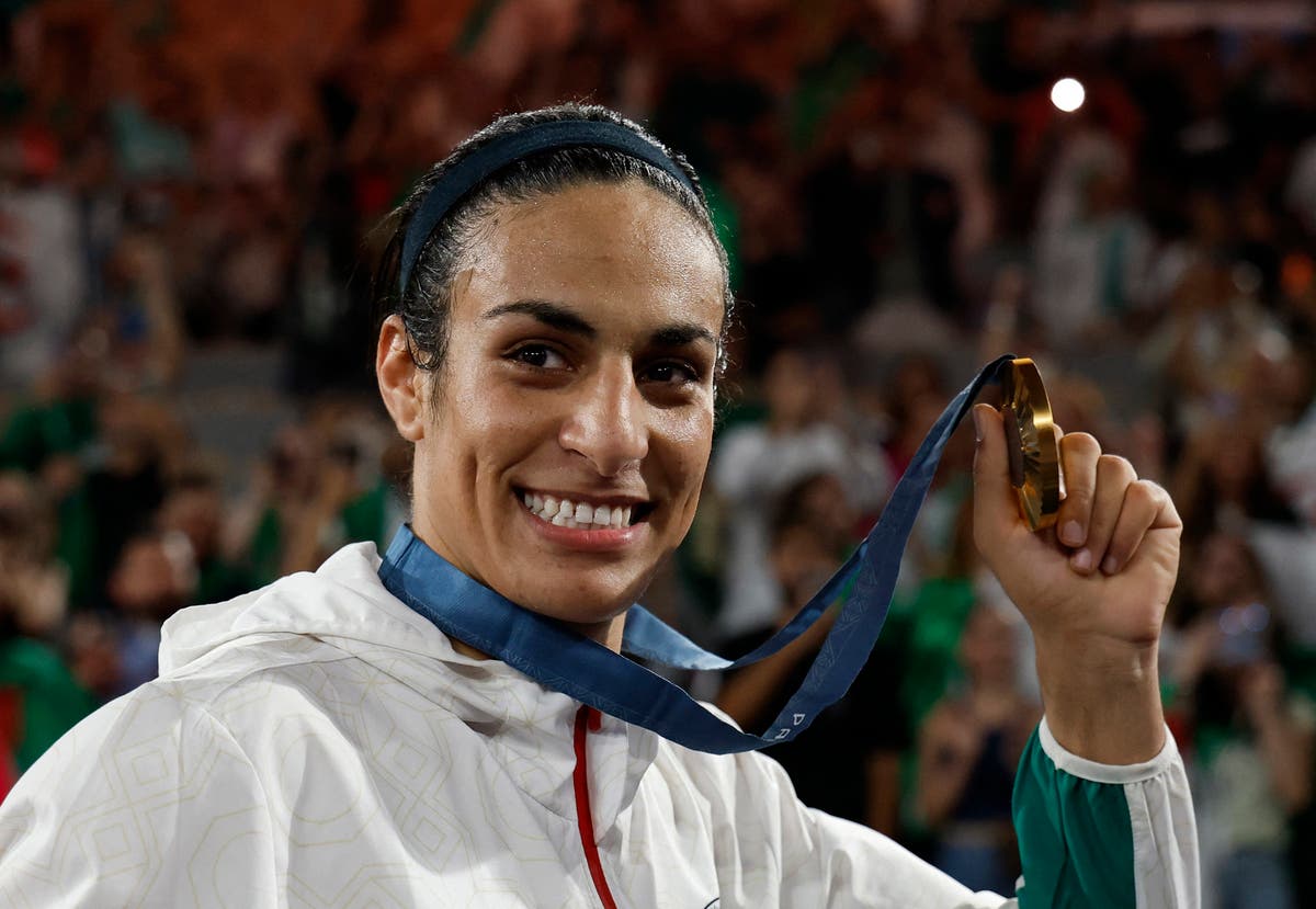 Imane Khelif hits out at &lsquo;enemies of success&rsquo; after fighting through gender row to win Olympic gold