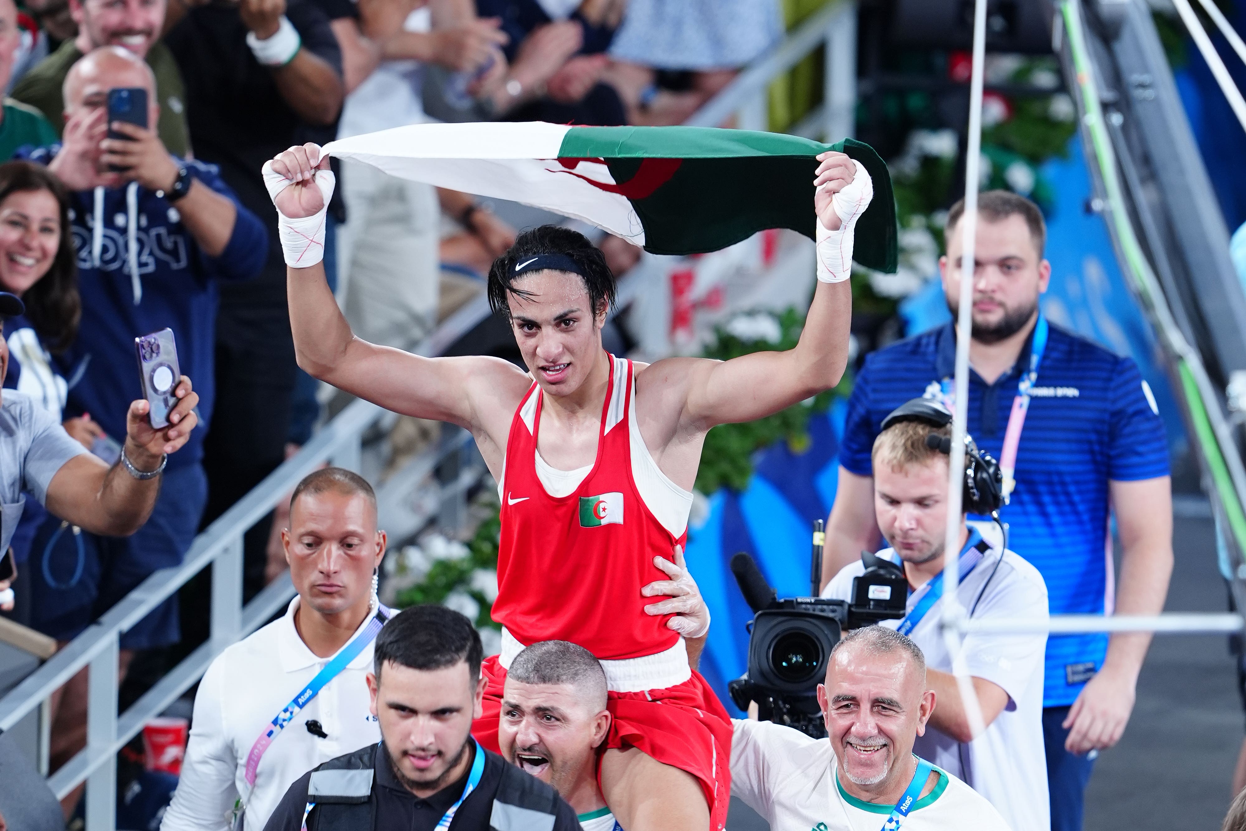 Algeria's Imane Khelif celebrates Olympic gold