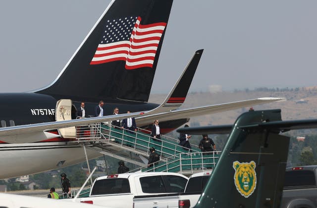 <p>Members of former President Donald Trump's team disembark from his Boeing 757 after arriving at the Billings Logan International Airport in Billings, Montana on Friday afternoon, August 9, 2024, enroute to Bozeman</p>