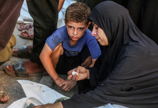 <p>Al-Tabaeen school and mosque, which had been sheltering displaced people, was hit in Gaza City</p>