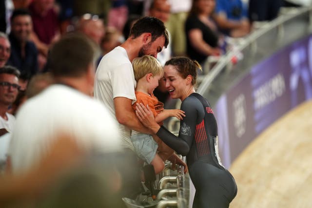 Elinor Barker celebrates with her son and partner, Casper Jopling (David Davies/PA)