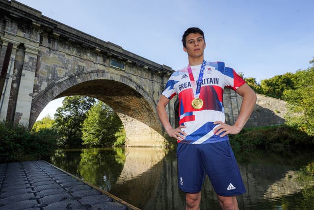 Great Britain modern pentathlete Joe Choong with his Olympic gold medal from Tokyo 2020 (PA)