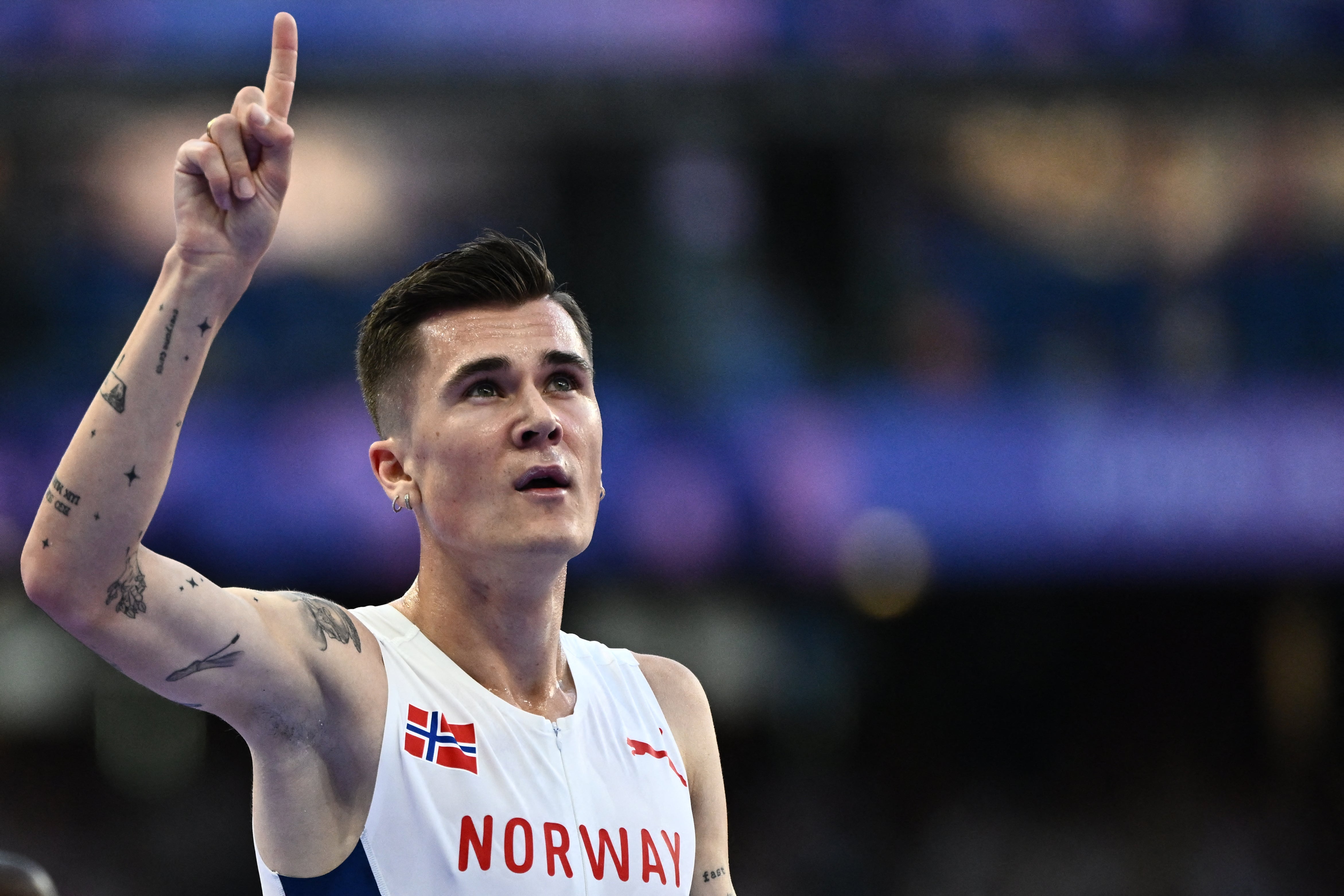 Norway's Jakob Ingebrigtsen celebrates after the 5,000 metres