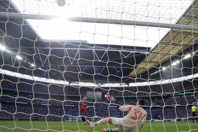 Manchester United’s Jonny Evans puts his penalty over the bar (Nick Potts/PA).