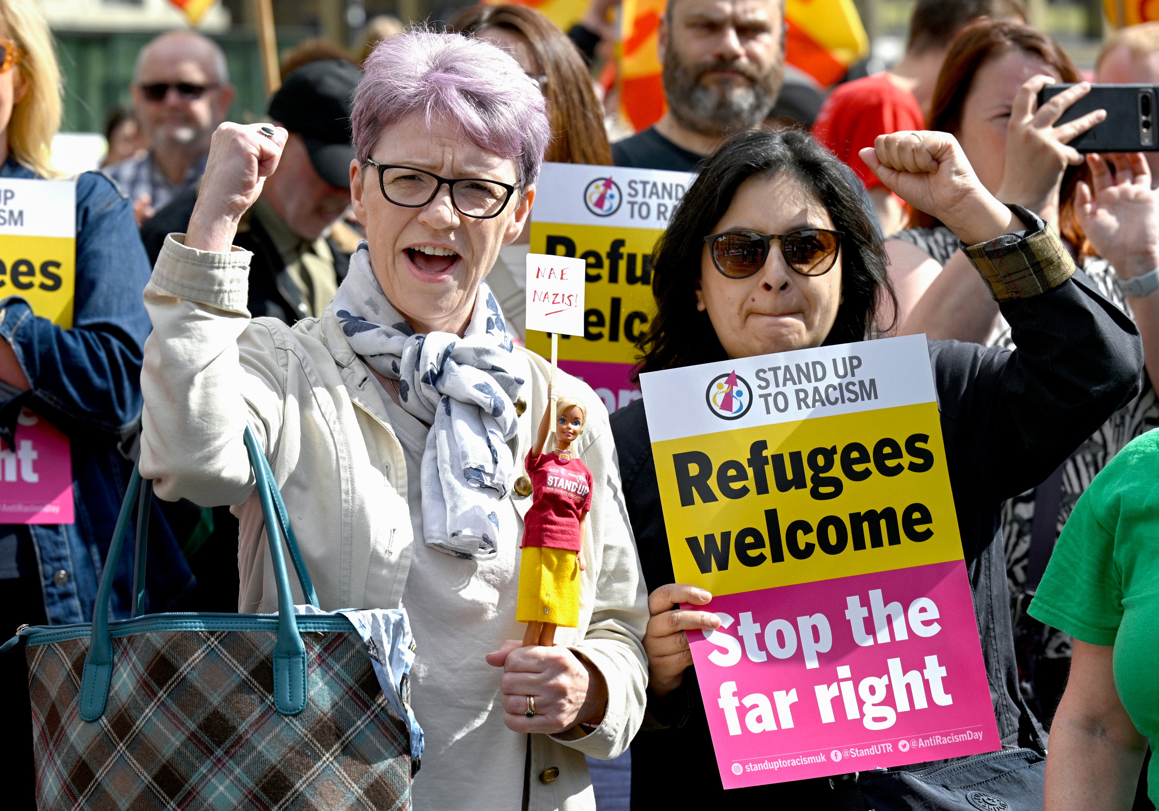 Demonstrators during an anti-racism protest organised by Stand Up to Racism in George Square, Glasgow