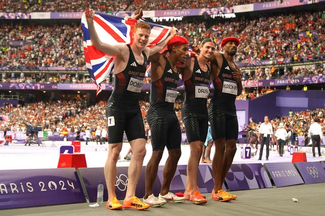 Great Britain’s Charlie Dobson (left), Alex Haydock-Wilson, Lewis Davey and Matthew Hudson-Smith (right) celebrate winning bronze in the men’s 4x400m relay final (Martin Rickett/PA).