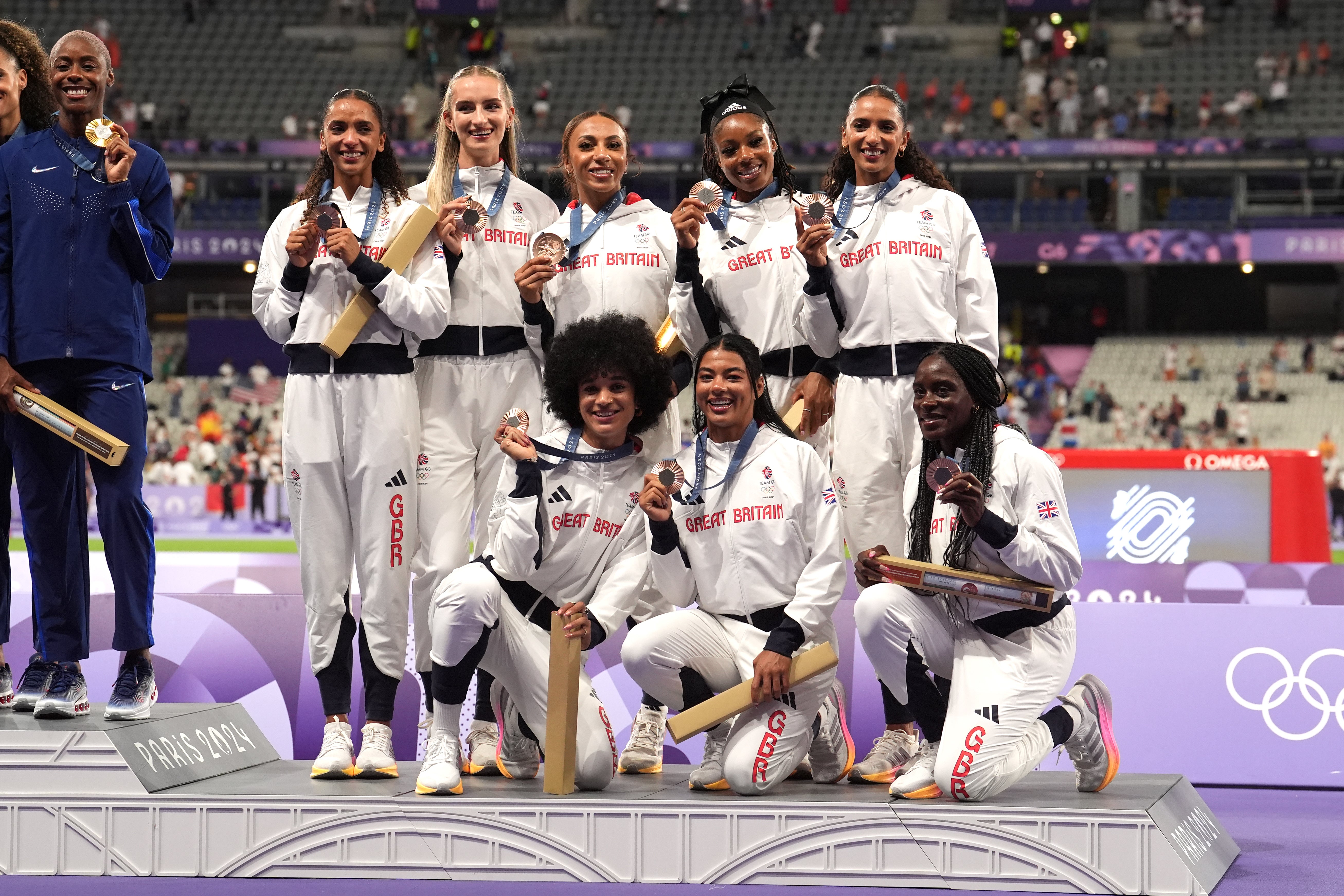 Jodie Williams, Lina Nielsen, Hannah Kelly, Yemi Mary John, Amber Anning, Nicole Yeargin, Laviai Nielsen and Victoria Ohuruogu (not in order) with their bronze medal (Martin Rickett/PA)