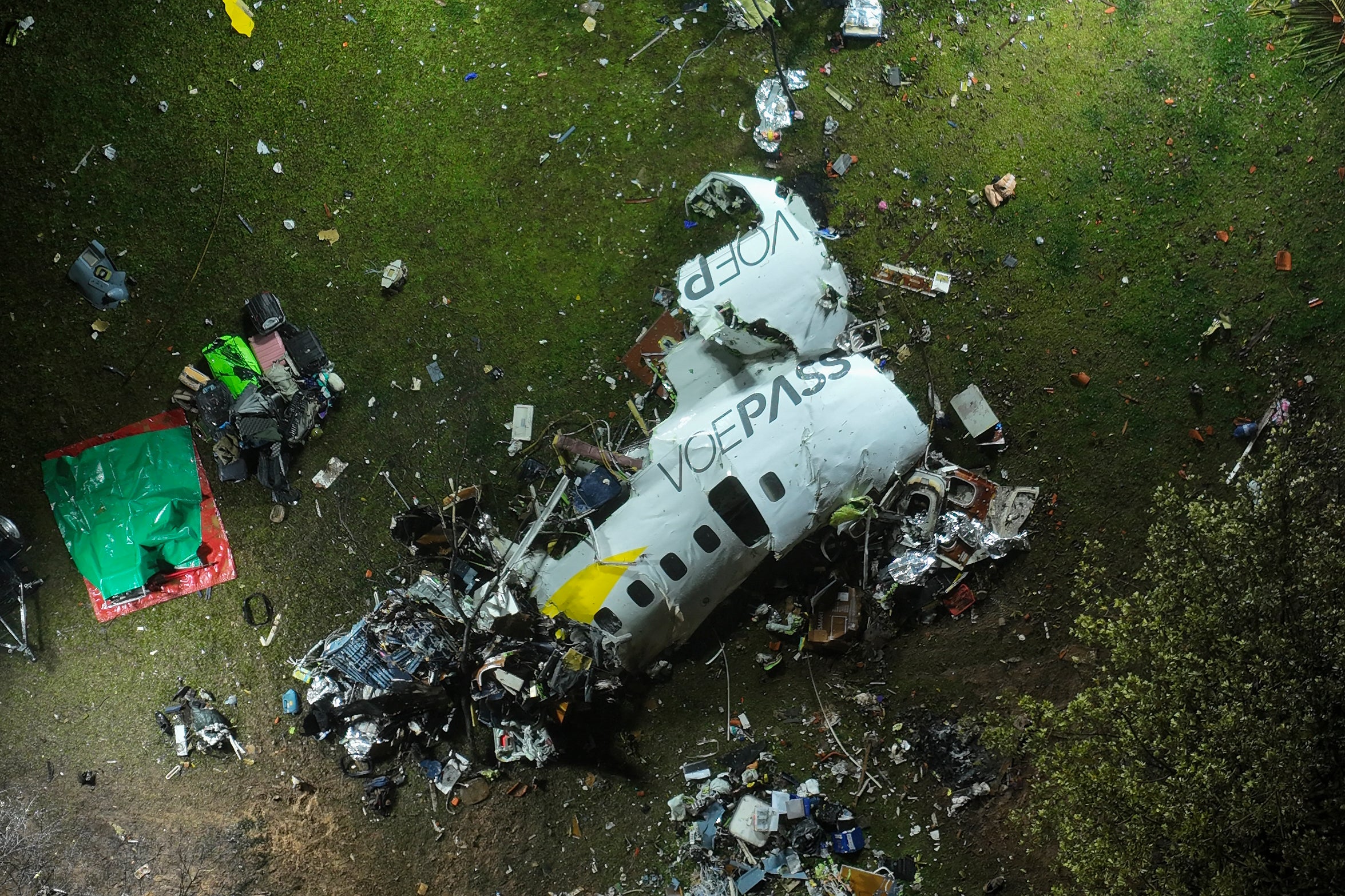 The debris of the plane is seen at the site of the crash in Vinhedo