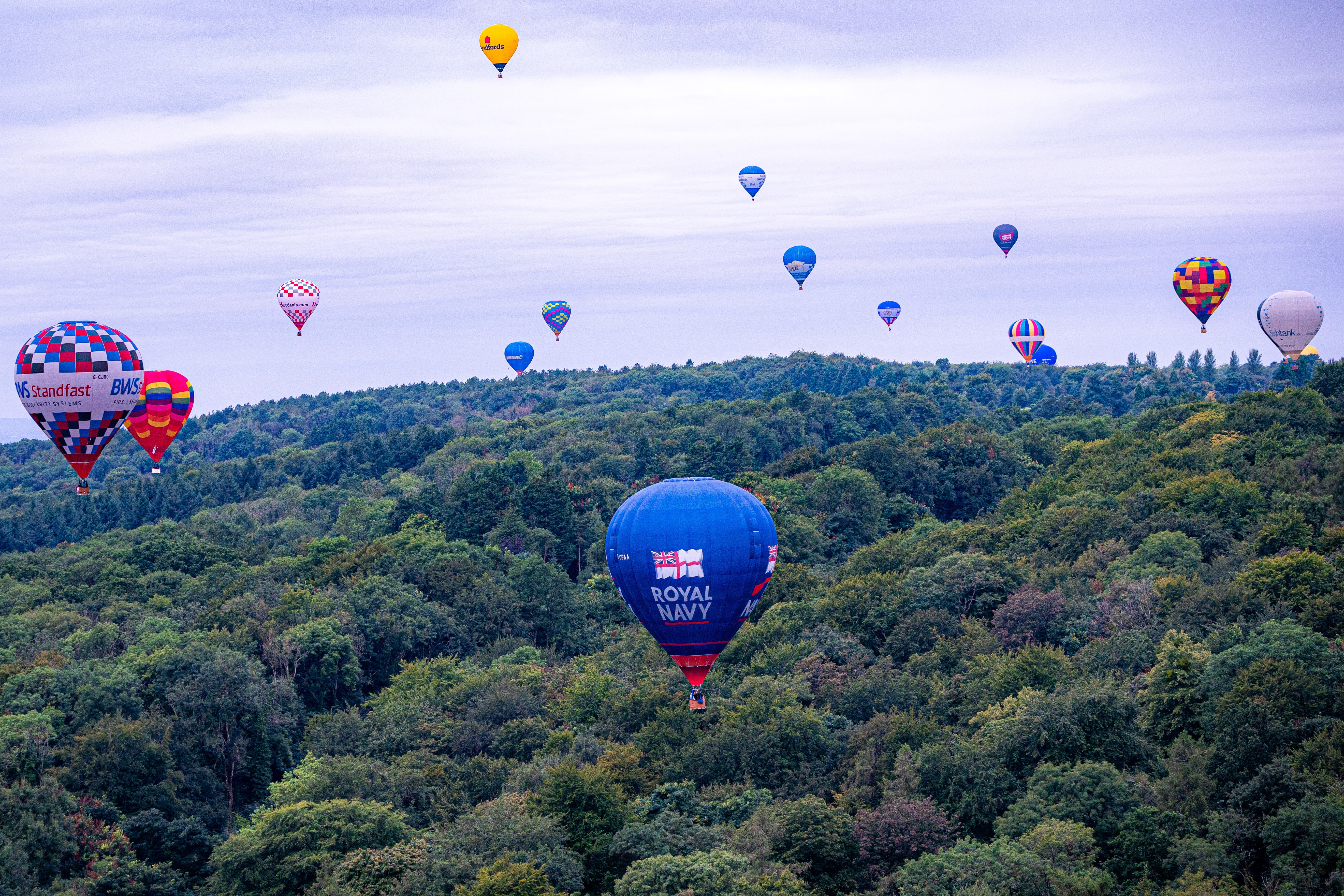 Hot air balloons float above north Somerset at the 46th Bristol International Balloon Fiesta (Ben Birchall/PA)