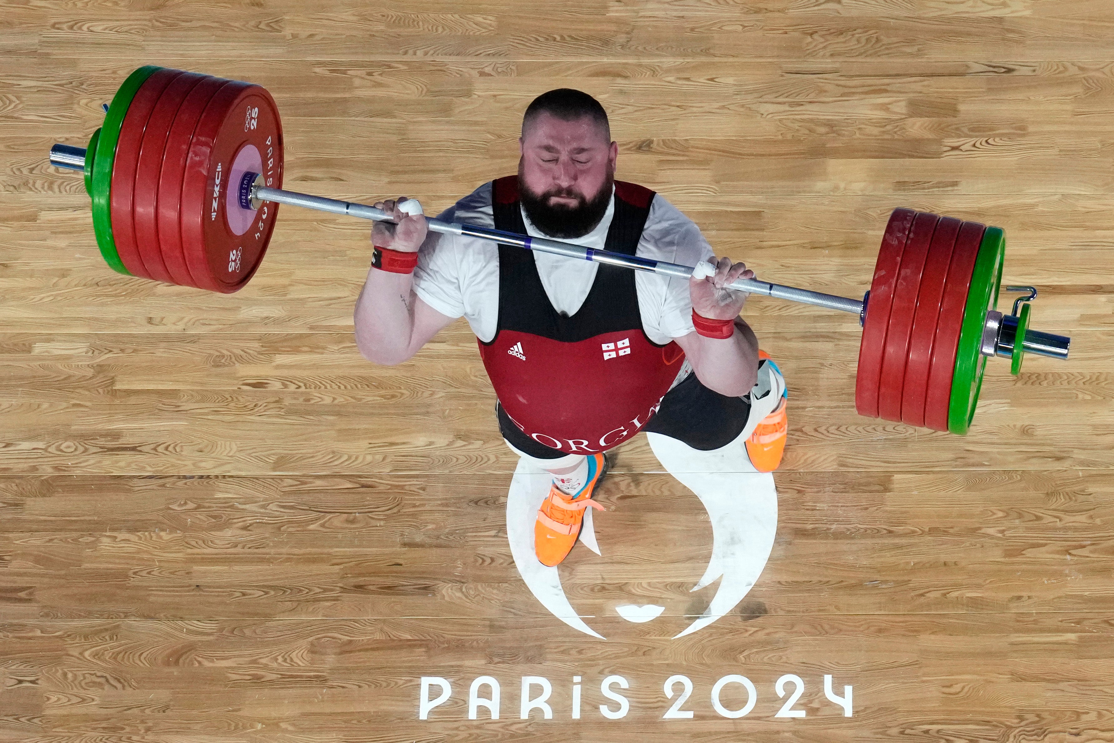 Lasha Talakhadze of Georgia competes during the men's +102kg weightlifting