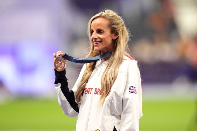 Georgia Bell celebrates with her bronze medal after the women’s 1500m final (Martin Rickett/PA)