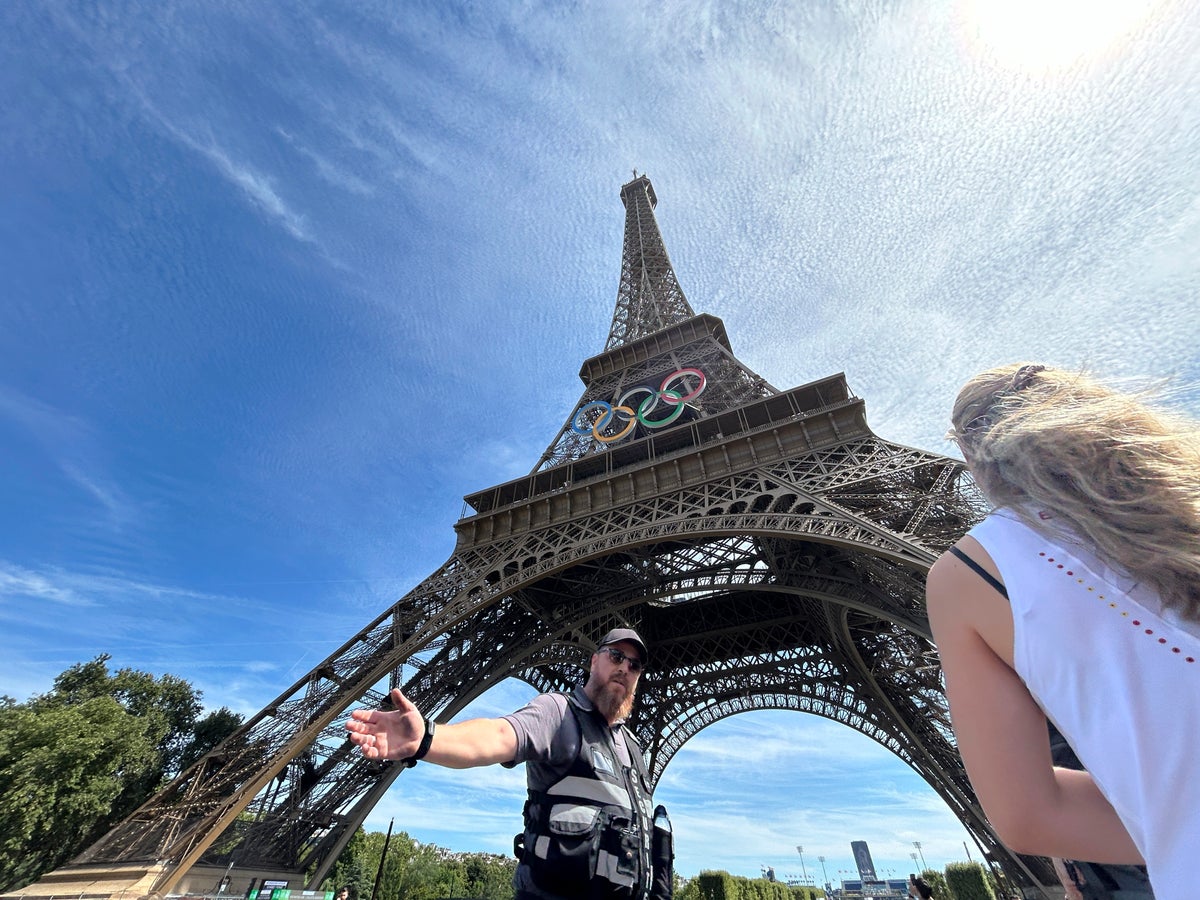 Eiffel Tower evacuated after man seen climbing hours before Olympics closing ceremony