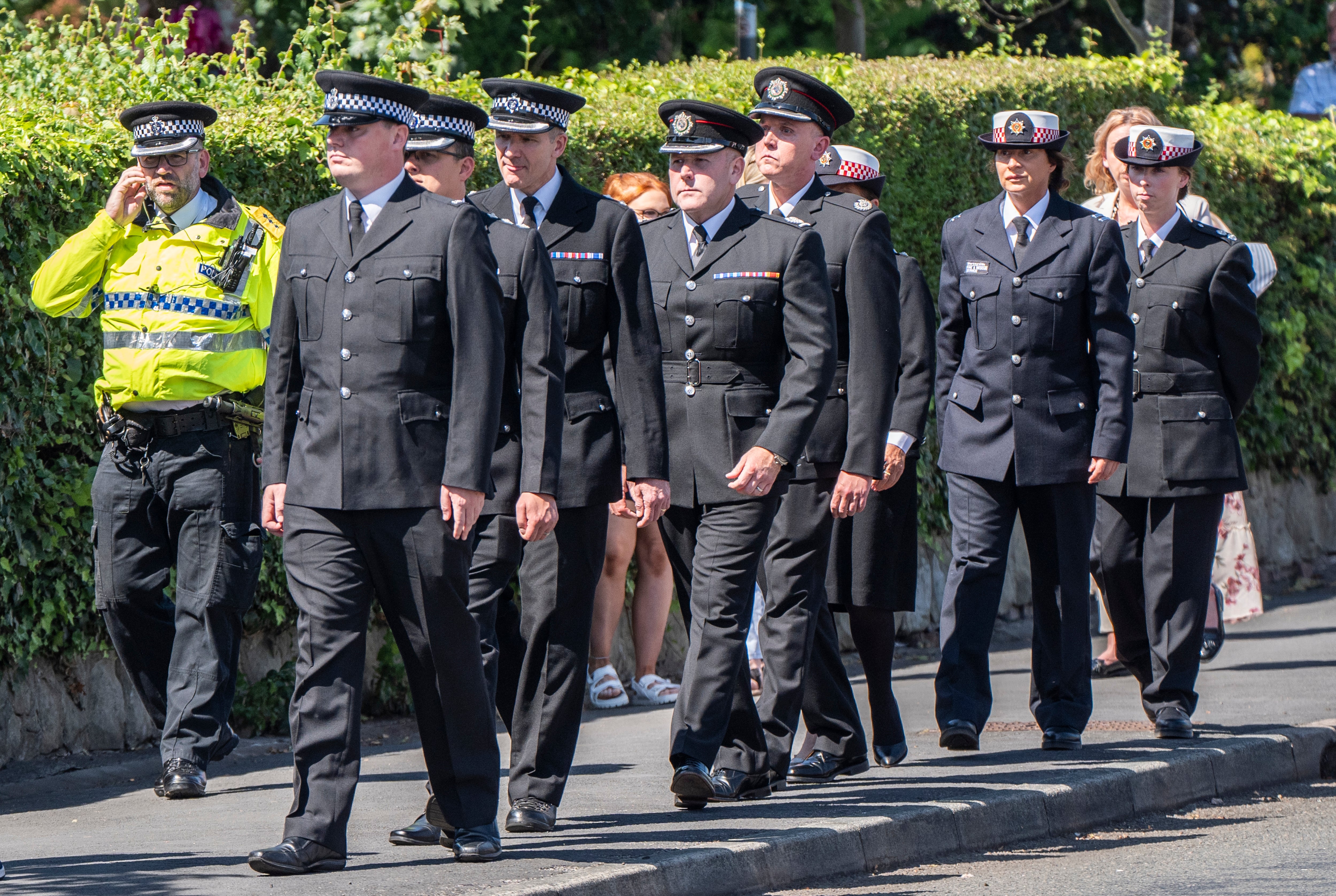 Police officers outside St Patrick's Church in Southport