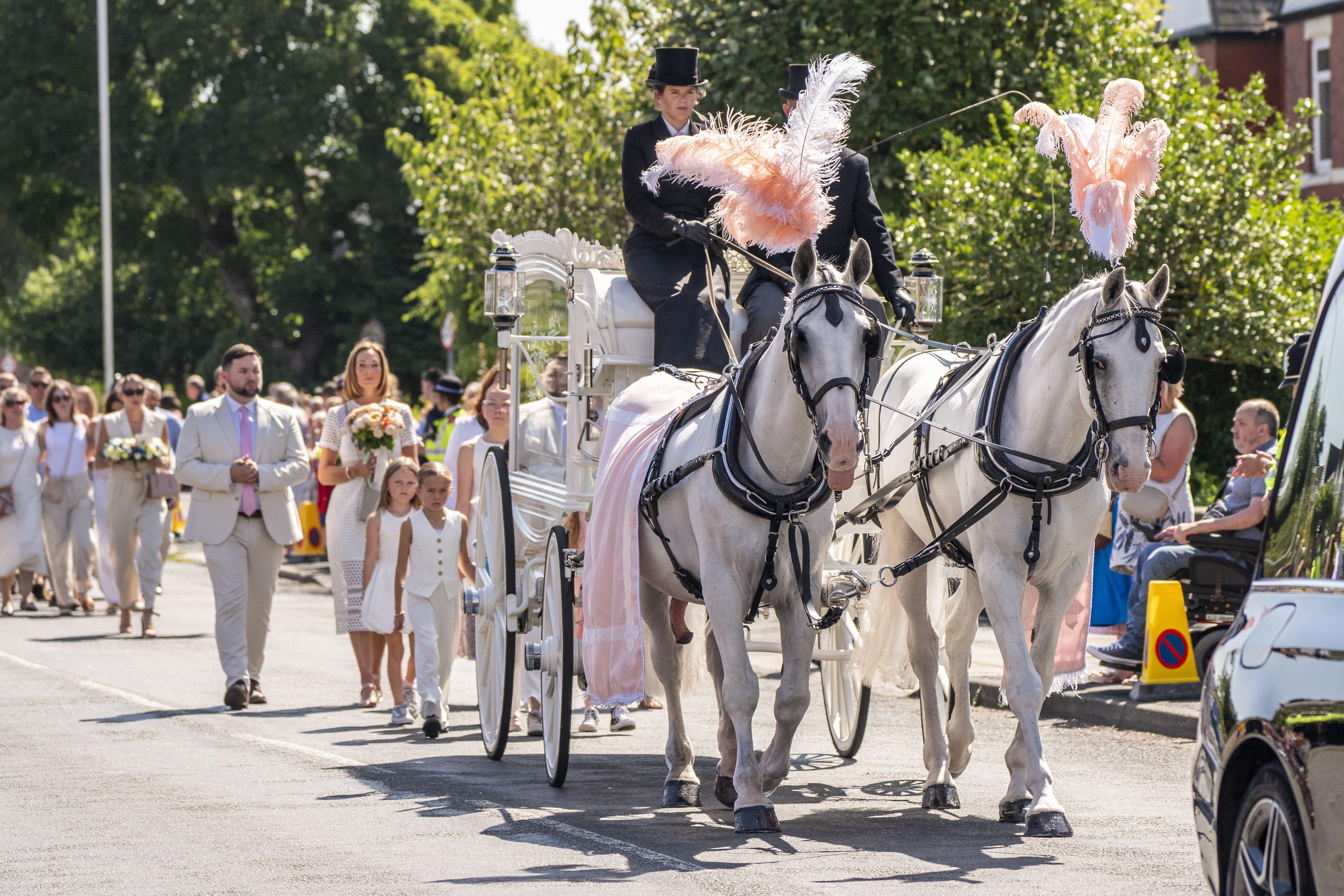 The horse-drawn carriage carrying the coffin of Southport stabbing victim Alice da Silva Aguiar arrives for her funeral at St Patrick’s Church (Danny Lawson/PA)