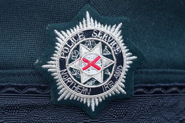 A stock picture of a Police Service of Northern Ireland (PSNI) logo badge (Niall Carson/PA)