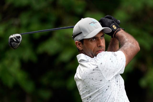 Aaron Rai watches his tee shot on the second hole (Chuck Burton/AP)