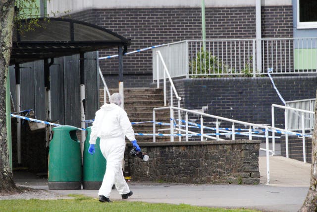 Forensic investigators at Amman Valley school, in Ammanford, Carmarthenshire (Ben Birchall/ PA Wire)