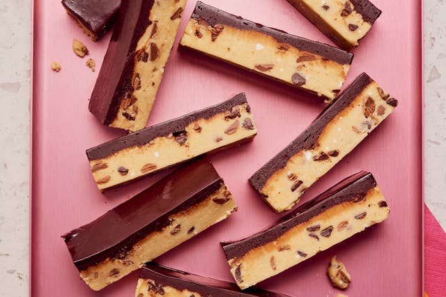 <p>This thick cookie dough is gloriously full of chocolate chips and topped with a thick chocolate ganache</p>