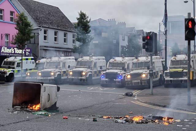 PSNI officers man road blocks in Belfast on August 3 (PA)