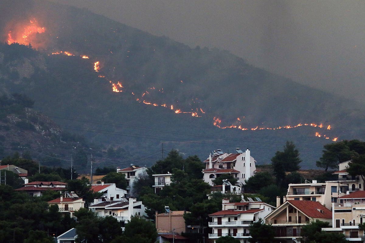 Greece fires: One dead, thousands evacuated as flames spread through Athens suburbs