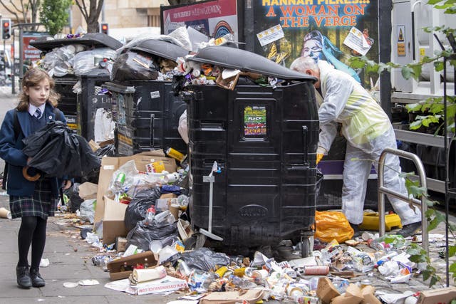 Previous strikes have caused rubbish to pile up in the streets (Lesley Martin/PA)