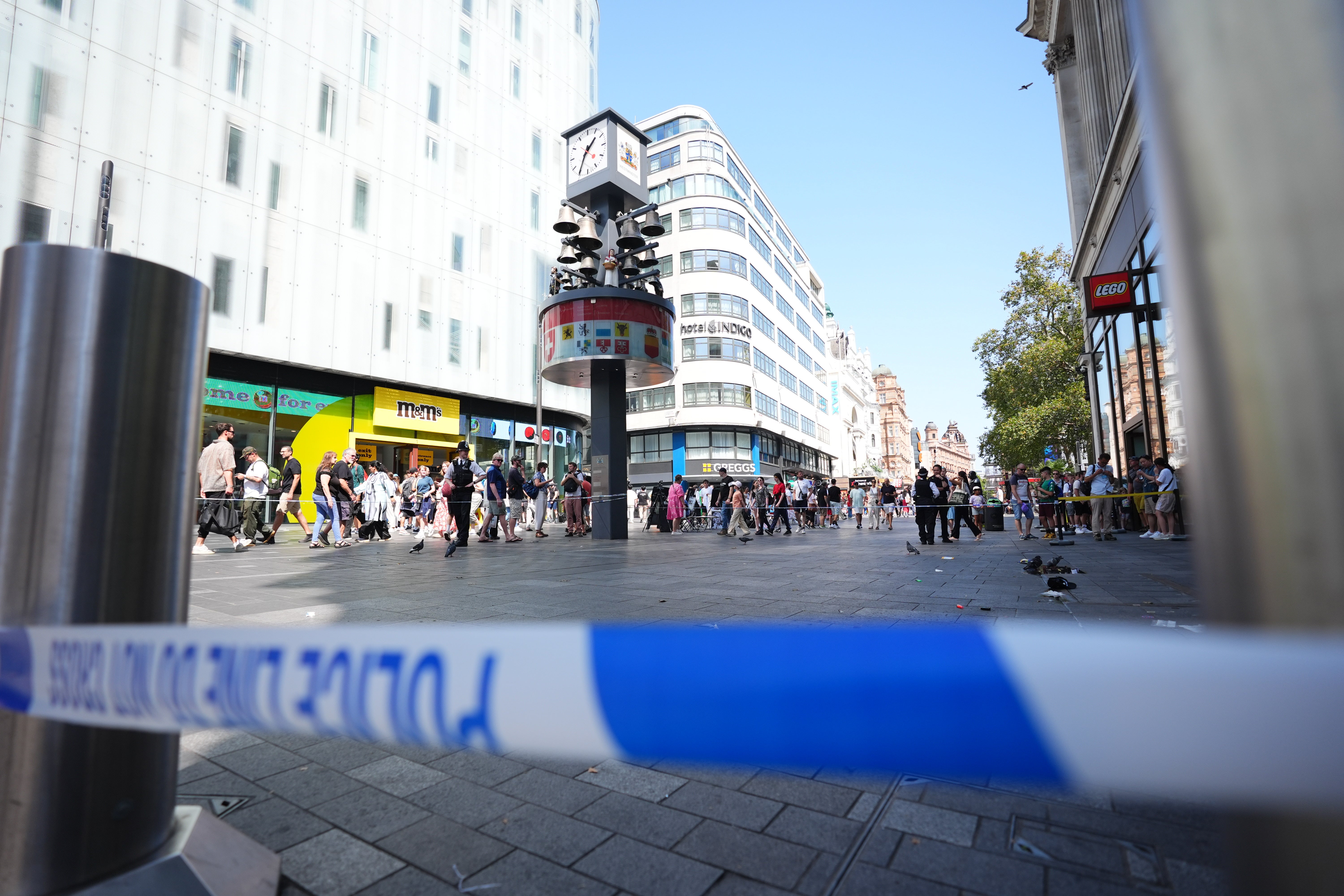 Officers at the scene outside the LEGO store in Leicester Square