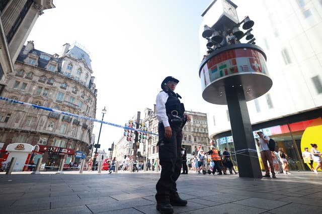 <p>An 11-year-old girl and woman were stabbed in Leicester Square</p>