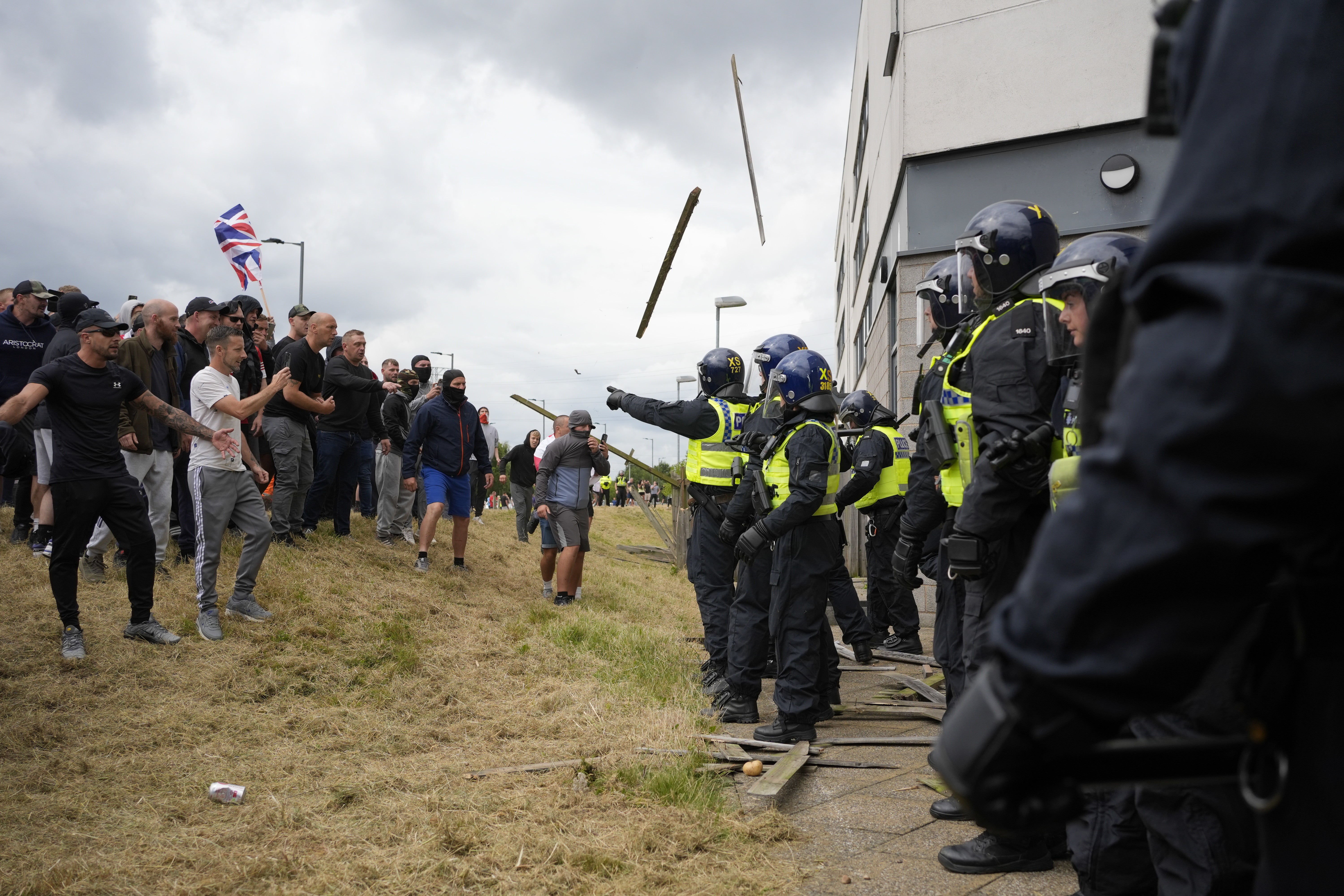 Violent protesters and police clashed outside Holiday Inn Express, Rotherham, on Sunday, August 4 (Danny Lawson/PA)