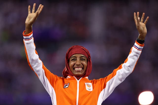 <p>Sifan Hassan of the Netherlands celebrates during the women’s marathon podium ceremony</p>