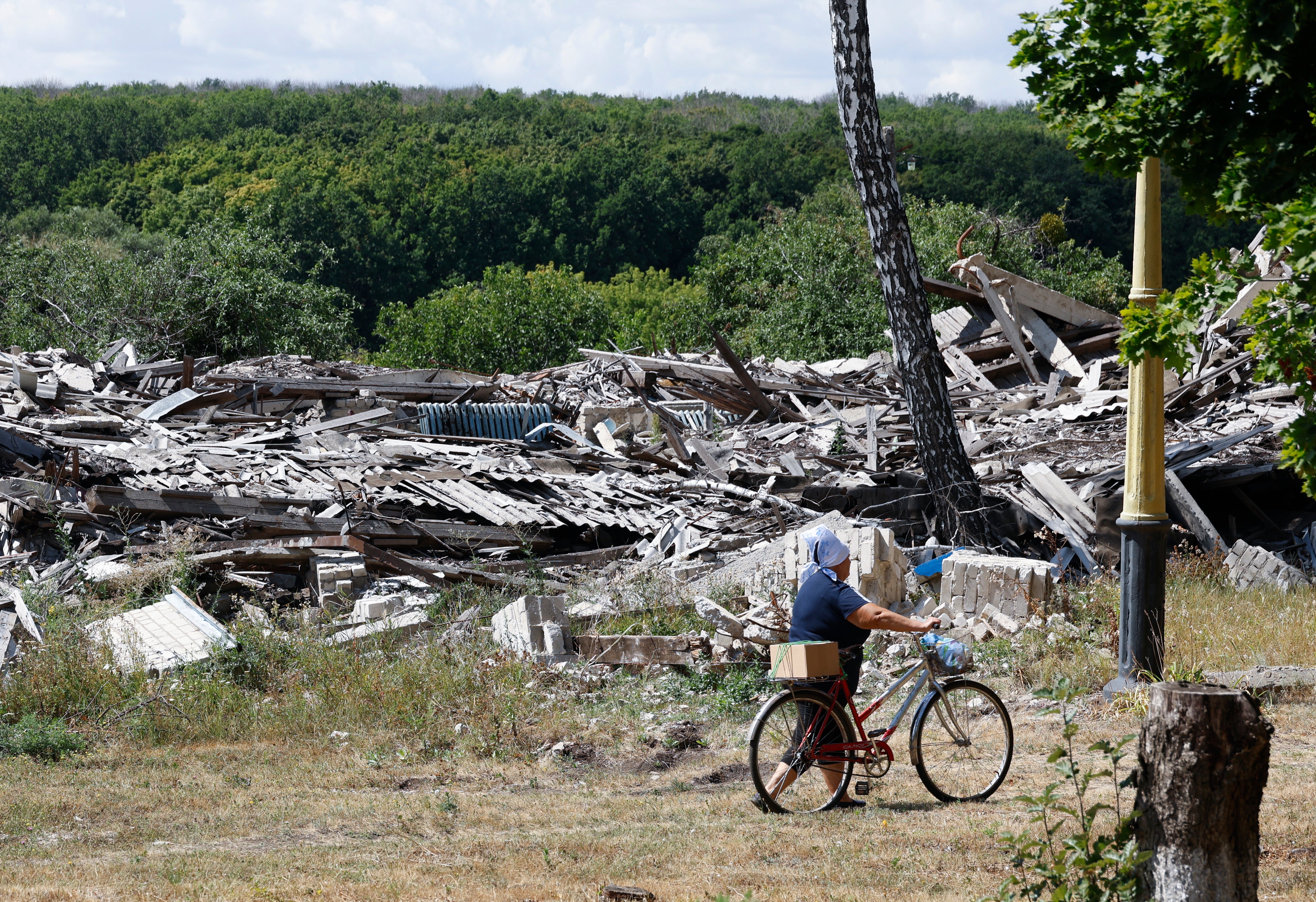 Ukrainian volunteers deliver humanitarian aid to the territories close to the frontline near Kharkiv earlier this month