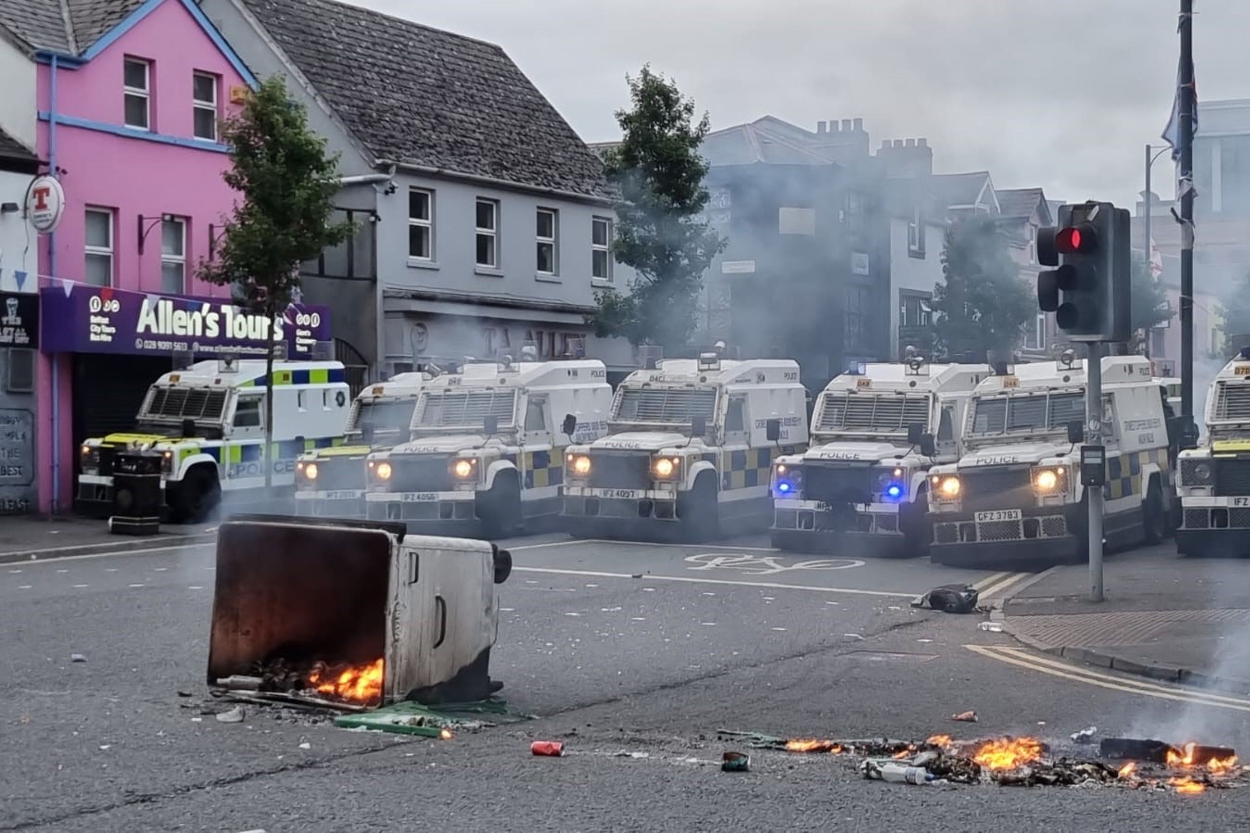 PSNI officers man road blocks in Belfast (PA)