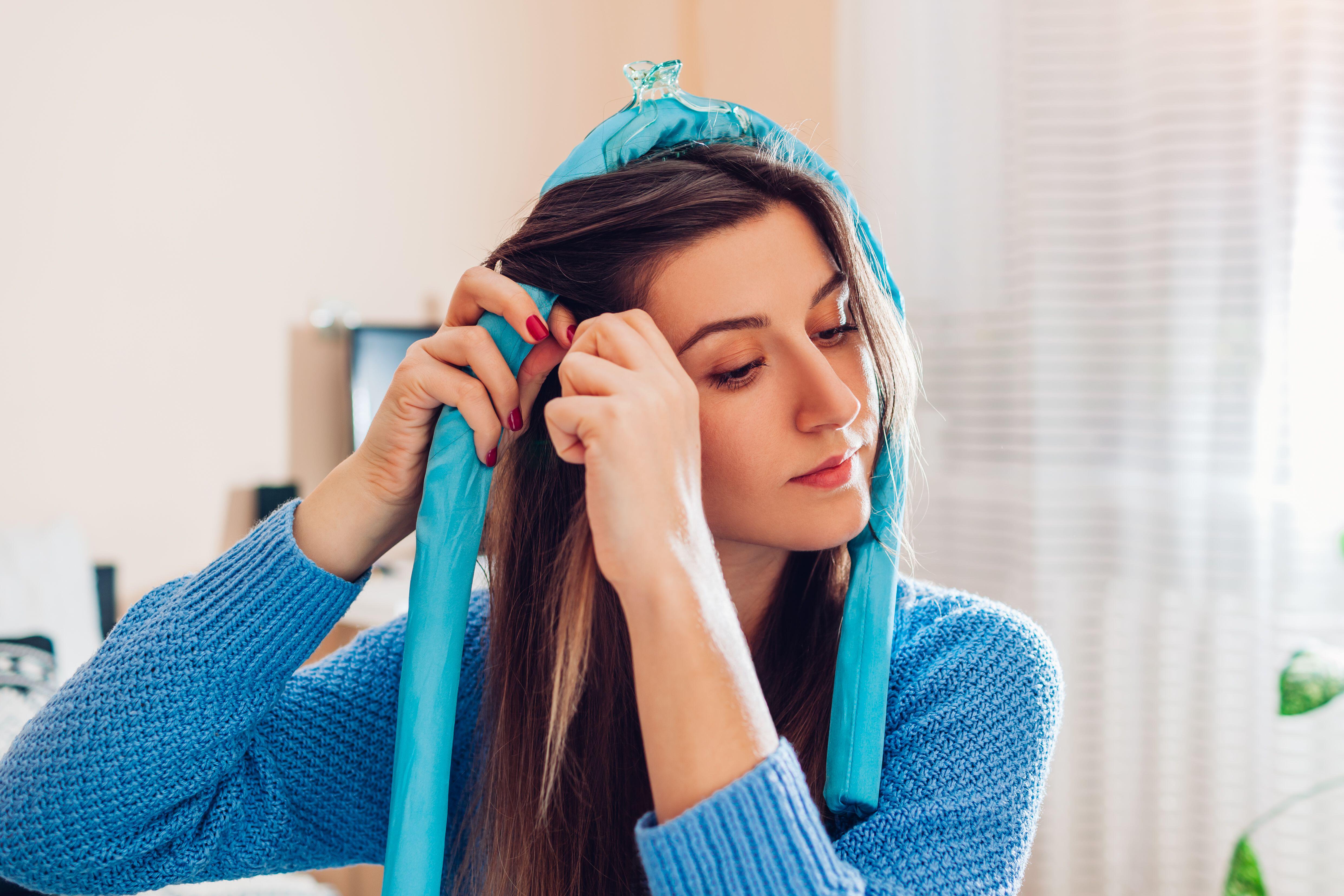 Using a heatless hair tool is better for hair health and saves on using electrical appliances (Alamy/PA)