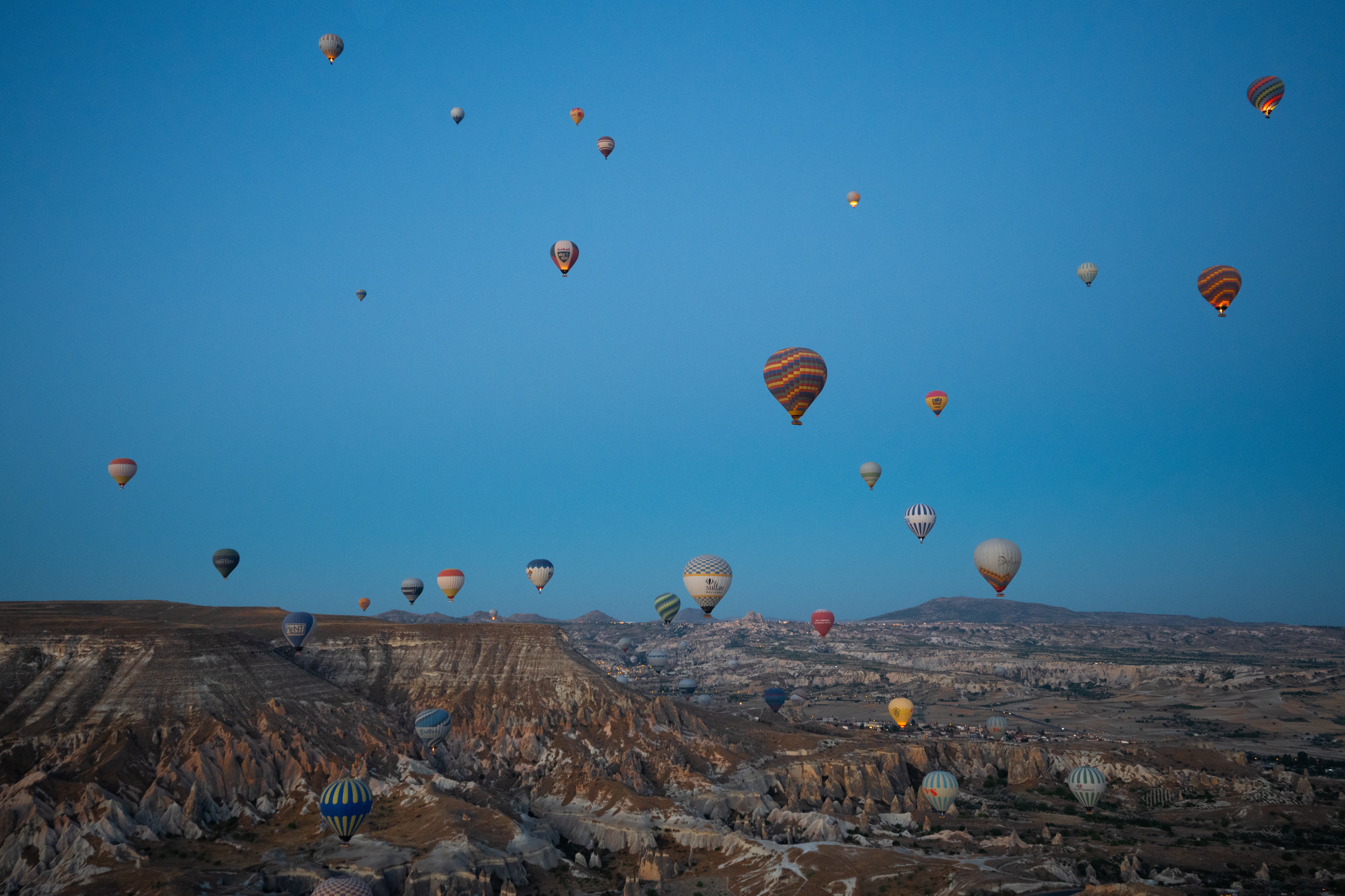 Scores of balloons depart every morning in Cappadocia, filling the sky with colour