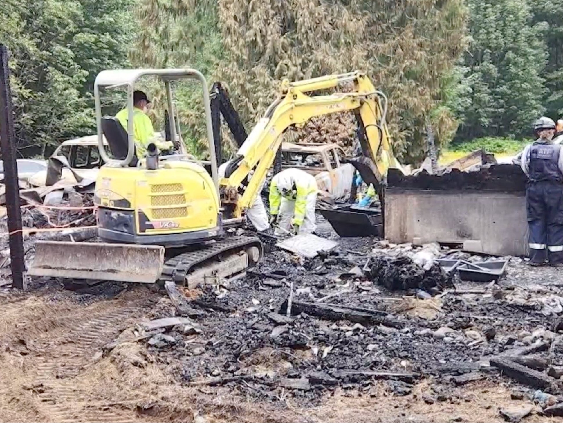 Photos shared by police shows the house reduced to charred rubble after the deadly fire on Friday in rural Washington