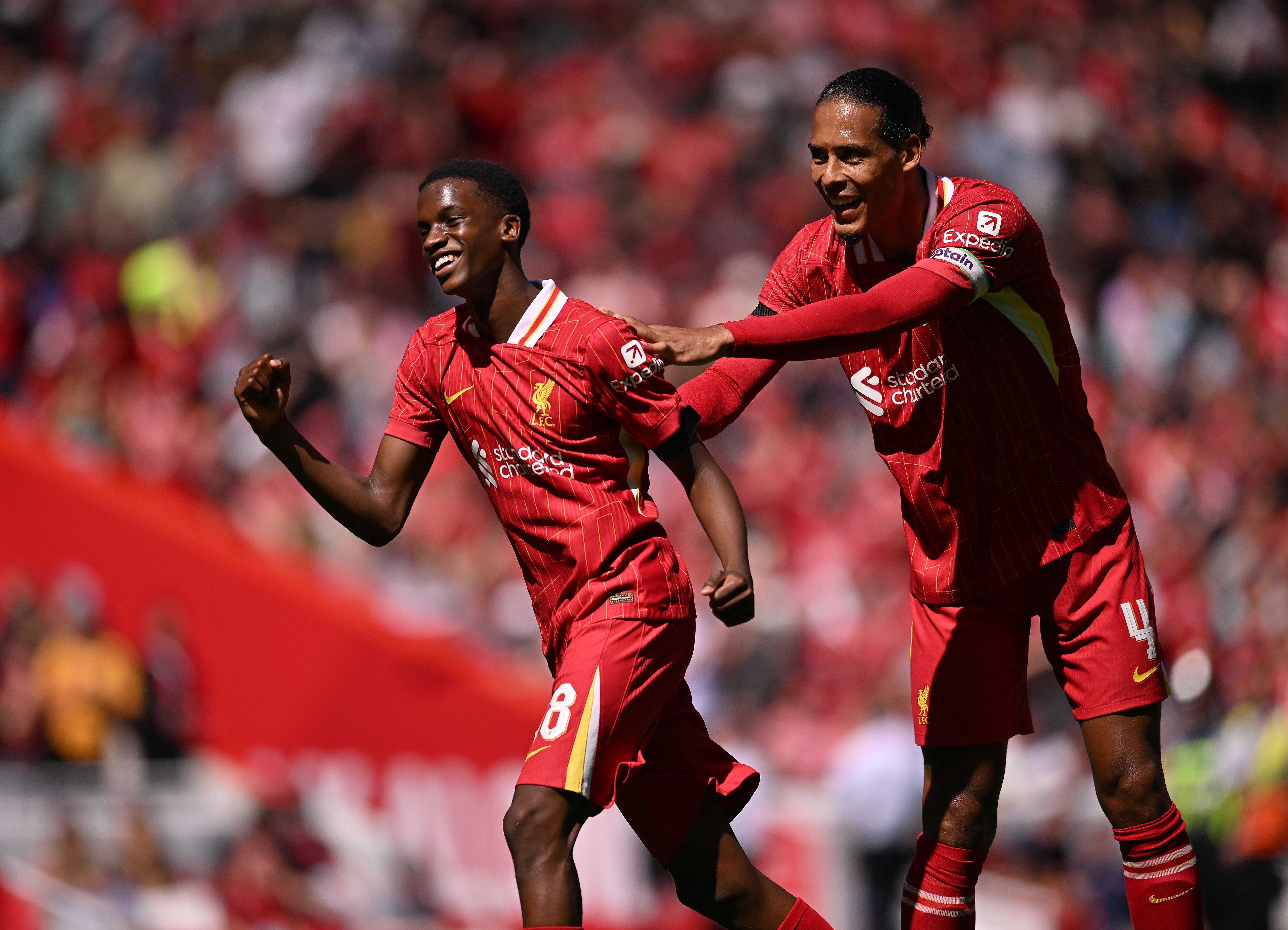 Trey Nyoni of Liverpool celebrates against Sevilla