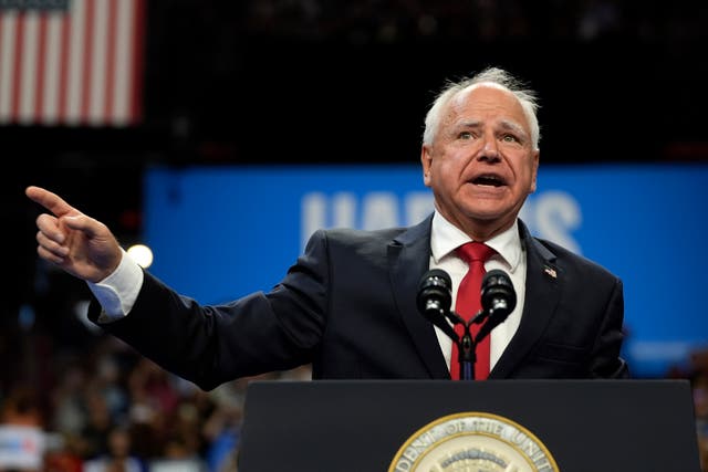 <p>Democratic vice presidential nominee Minnesota Gov. Tim Walz speaks at a campaign rally on August 10</p>