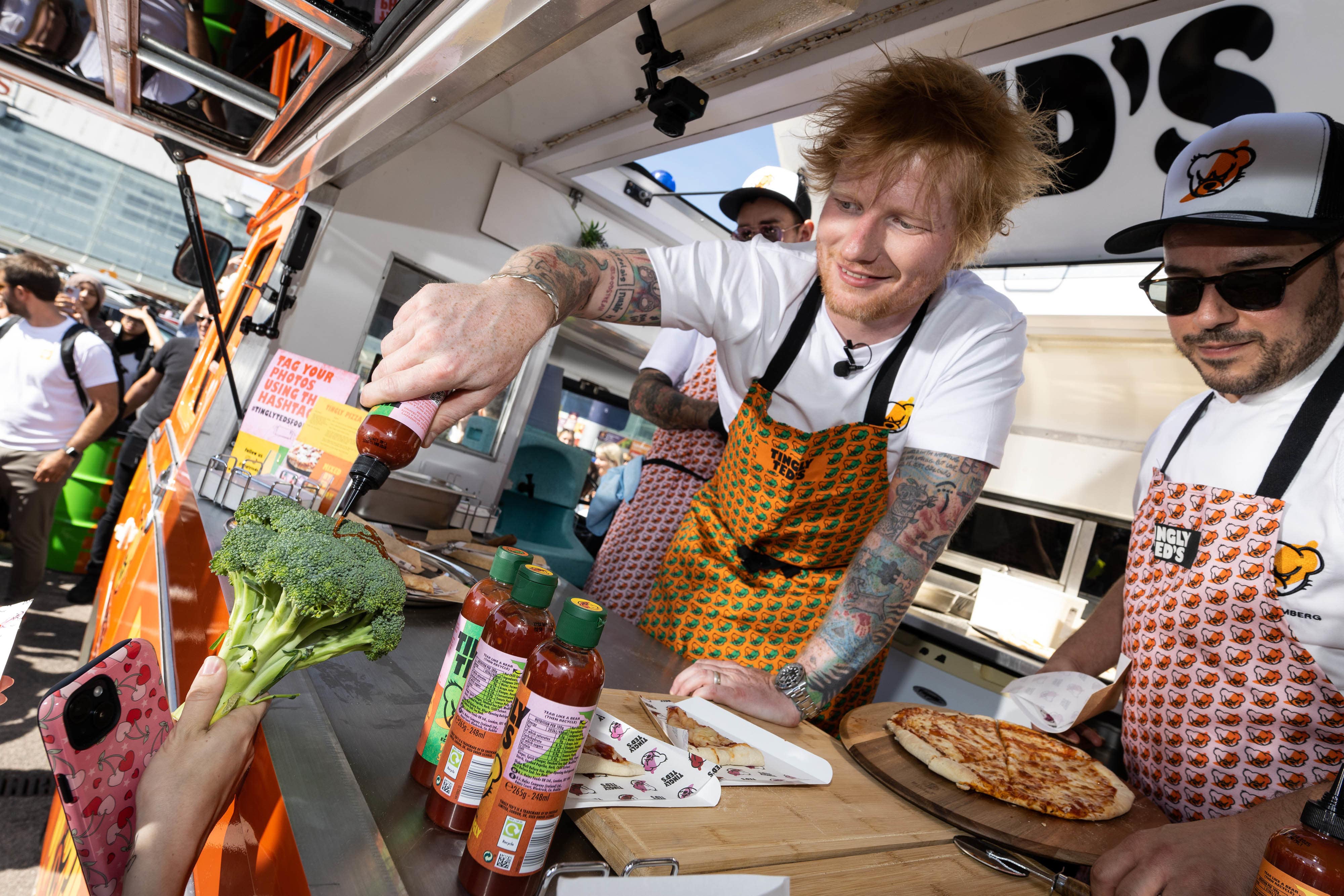 Ed Sheeran surprised Sainsbury’s supermarket shoppers in London Colney to promote his Tingly Ted’s hot sauce brand (Jeff Spicer Media Assignments/PA)