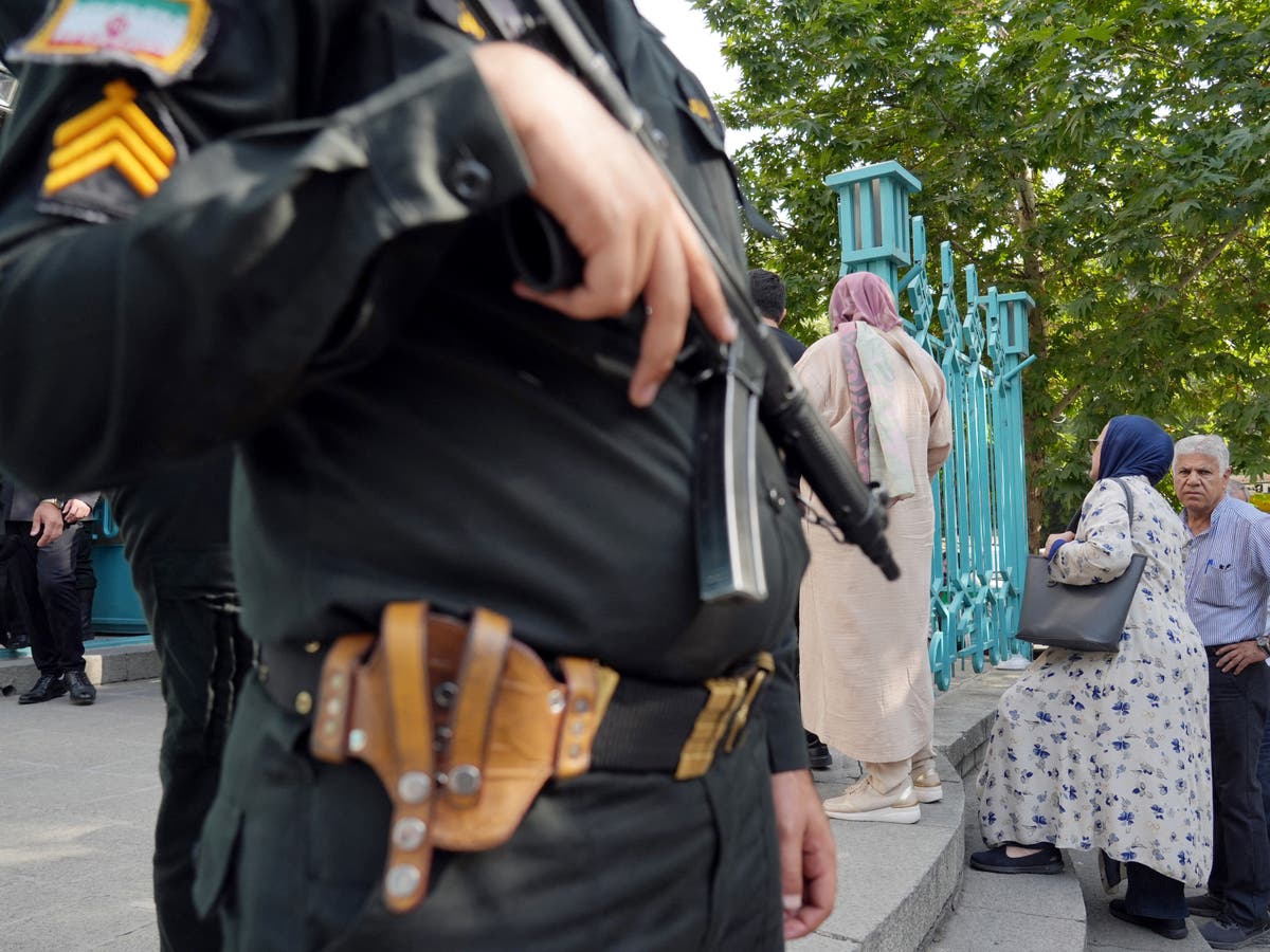 Iranian woman left paralysed after being shot by police over hijab