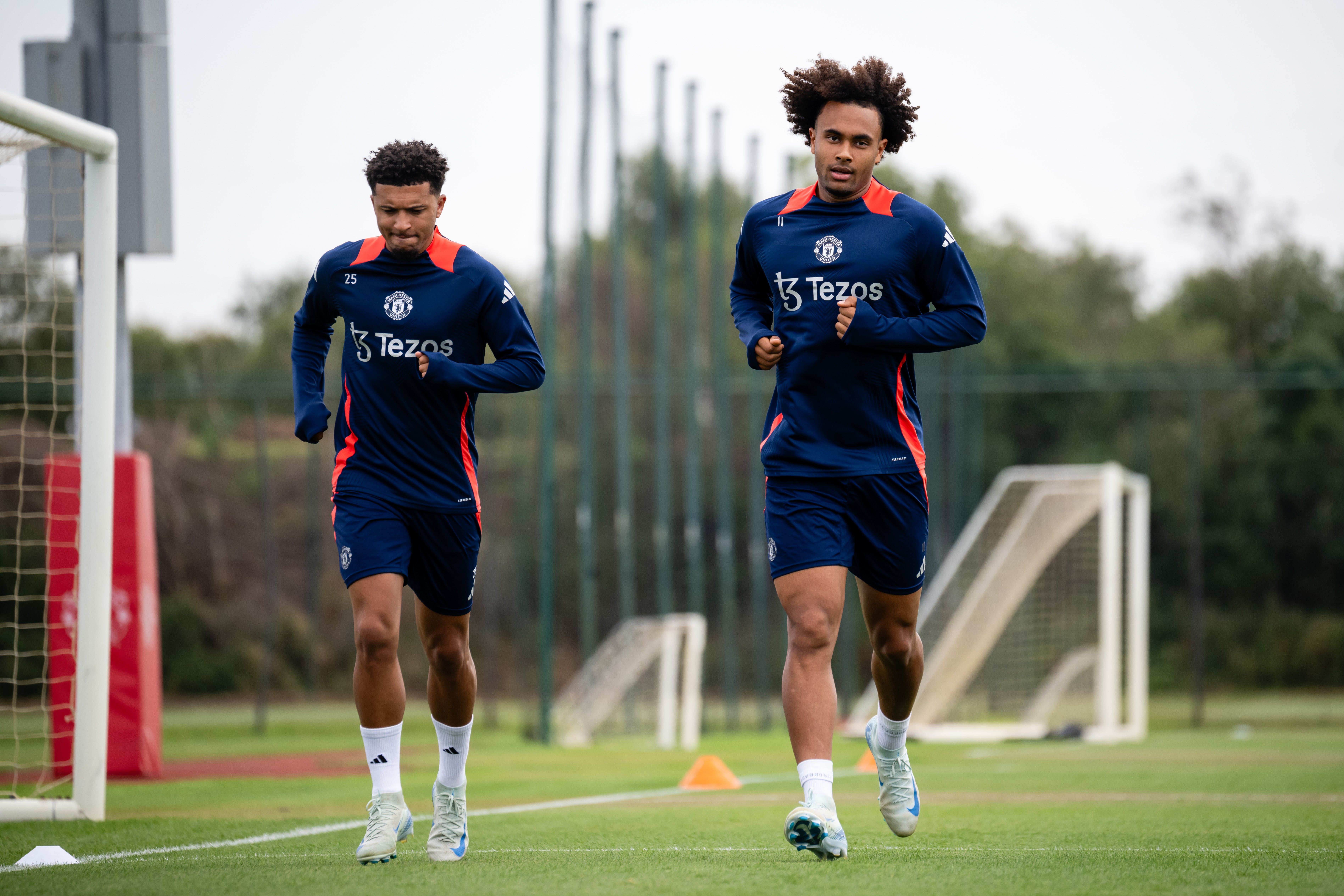 Manchester United's Jadon Sancho and Joshua Zirkzee in action during a first-team training session at Carrington Training Ground