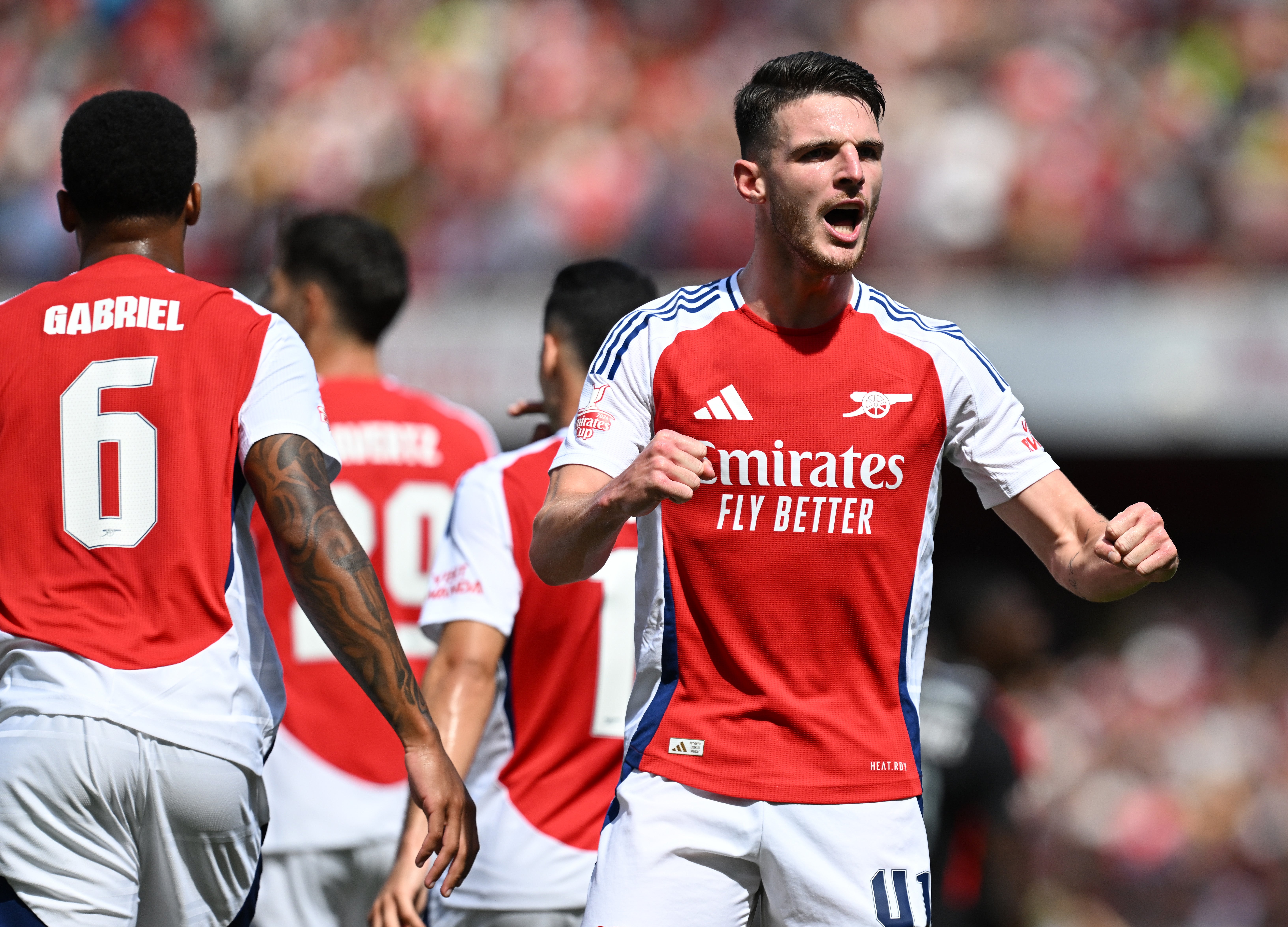 Declan Rice celebrates after William Saliba scores for Arsenal in a pre-season friendly with Olympique Lyonnais