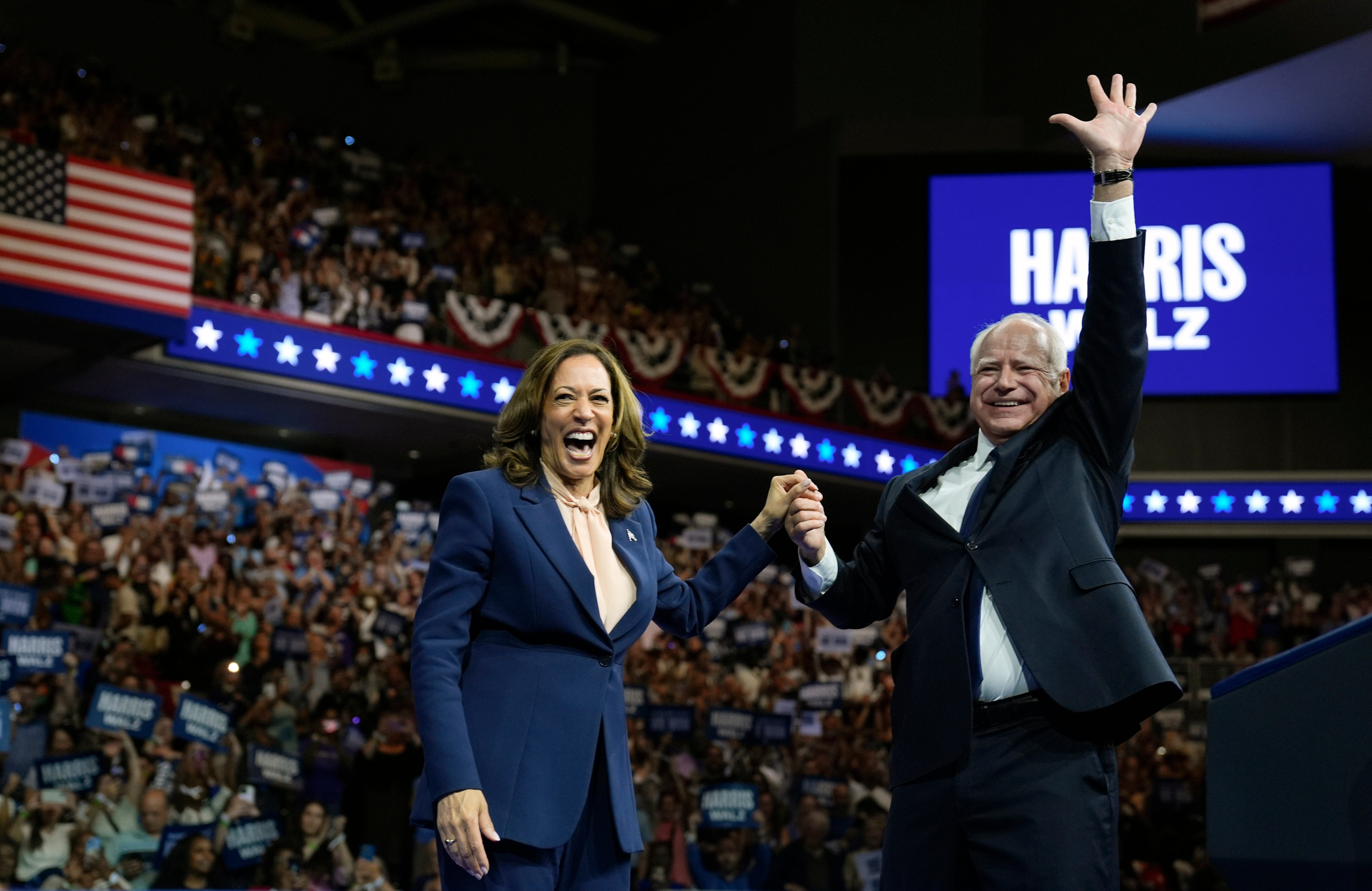 Democratic presidential nominee Vice President Kamala Harris and her running mate Minnesota Governor Tim Walz appear at a campaign event in Philadelphia on August 6