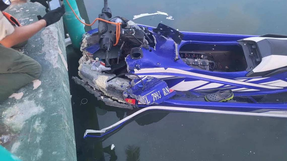 A father and son are dead after their jet ski slammed into a seawall on Tuesday night