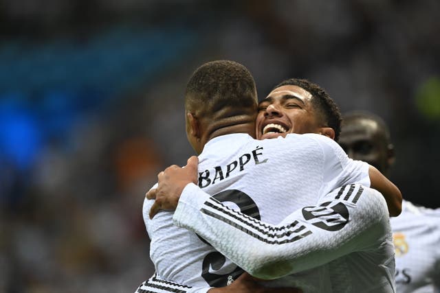 <p>Kylian Mbappe (front) of Real Madrid with teammate Jude Bellingham (back) celebrate </p>