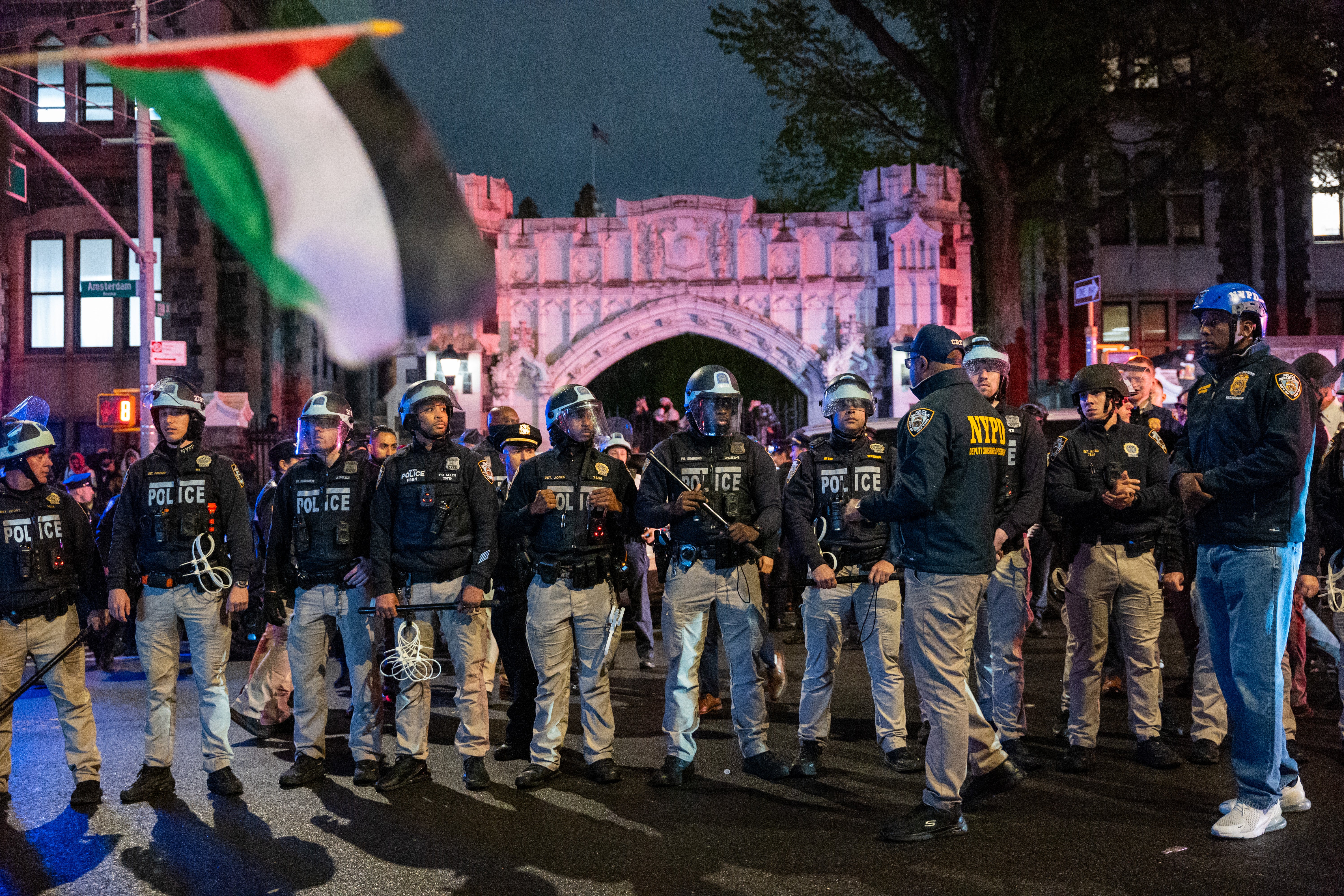 Police look on during pro-Palestinian demonstrations at The City College Of New York (CUNY) as the NYPD cracks down on protest camps at both Columbia University and CCNY on April 30 2024